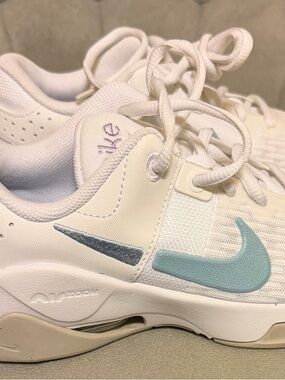 Nike White Trainers with Teal and Slate Swooshes